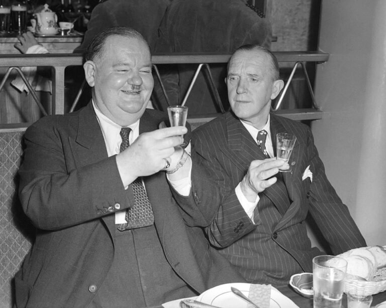 Stan and Ollie sampling schnapps in Stockholm 1947