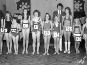 A.J Marriot Butlins Redcoat posing with Junior Princesses